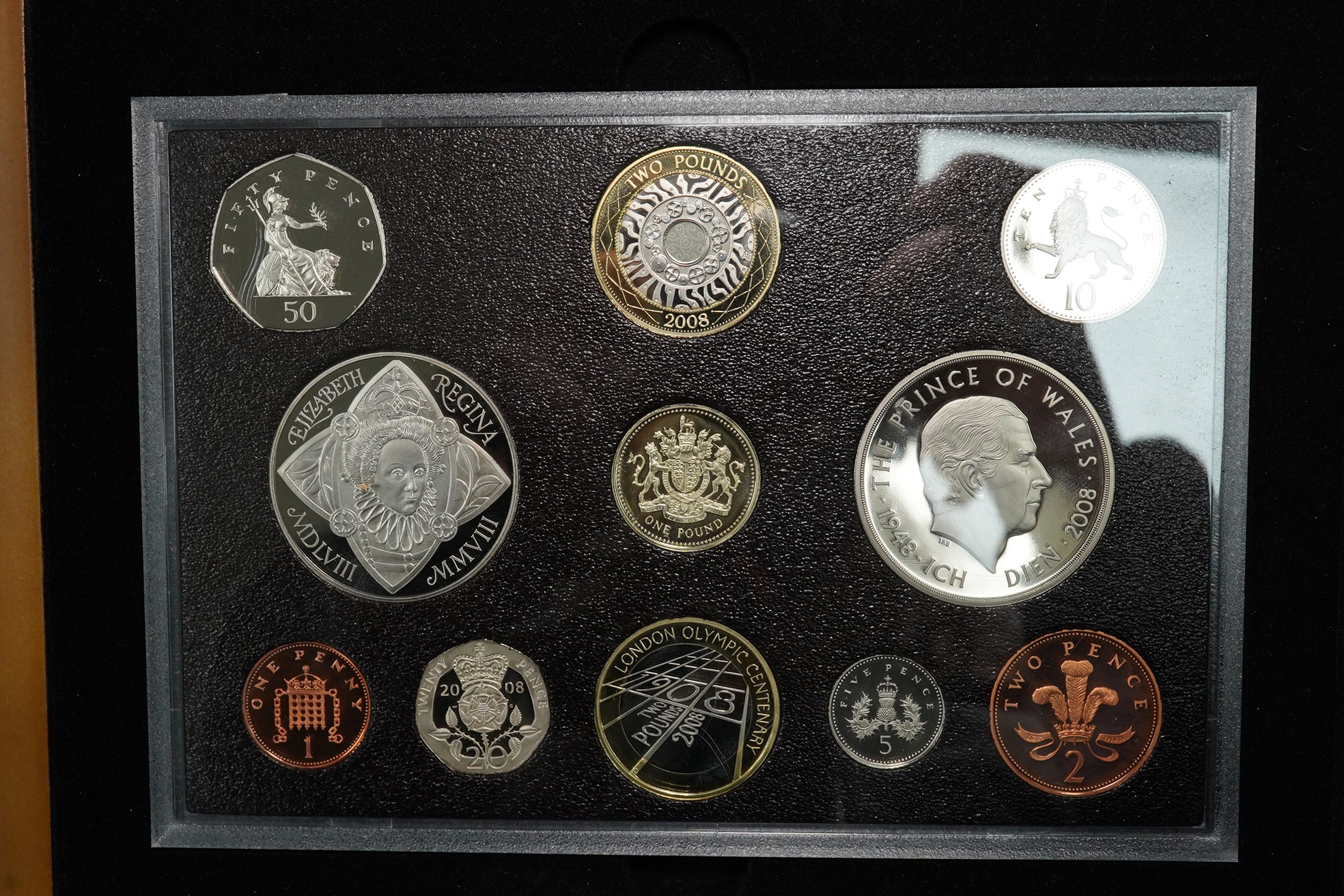 Royal Mint UK QEII coins, four executive proof coin sets, 2002 & 2003 in Golden Jubilee cases with certificates, 2007 & 2008, in wood cases of issue with certificates